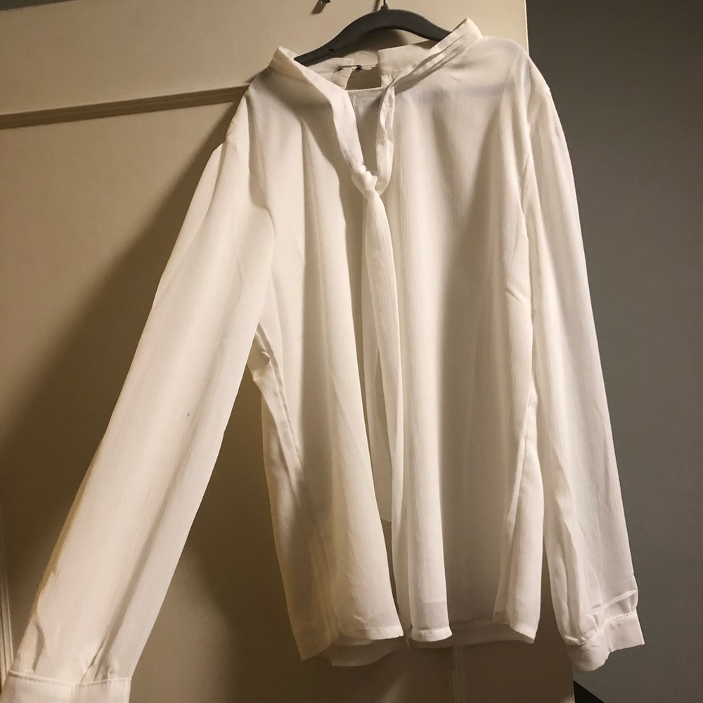 Professional white tie up flouncy shirt blouse